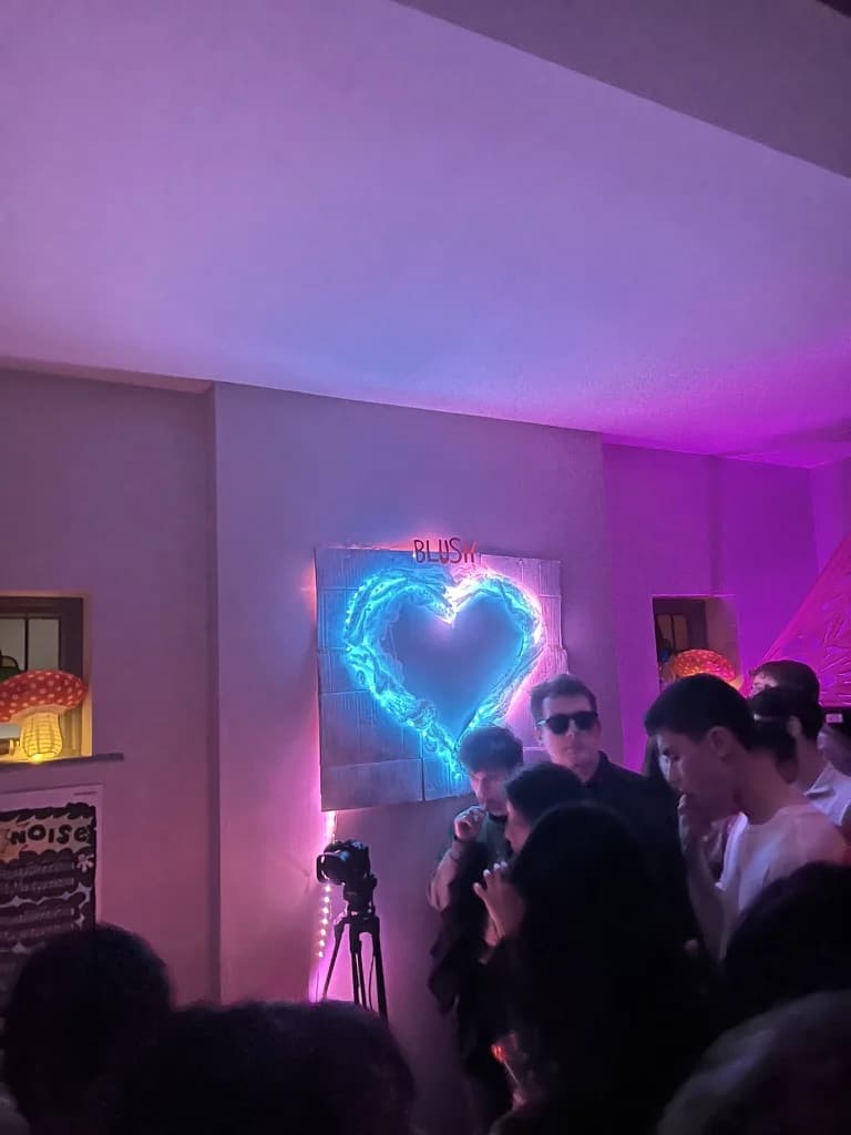 The BLUSH dancefloor under pink light